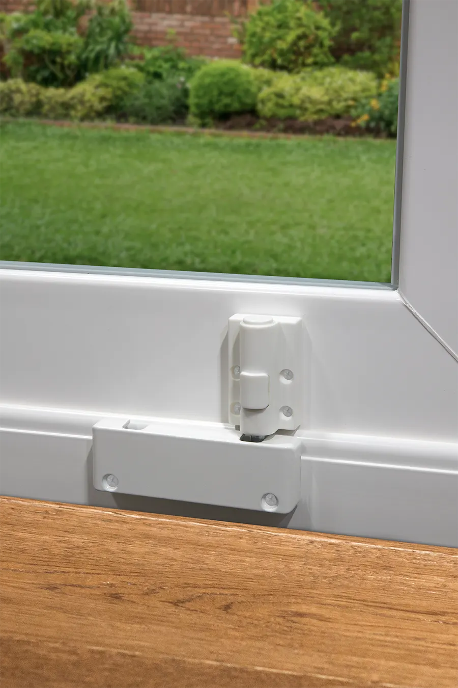 OKNA patio door push-button foot lock detail