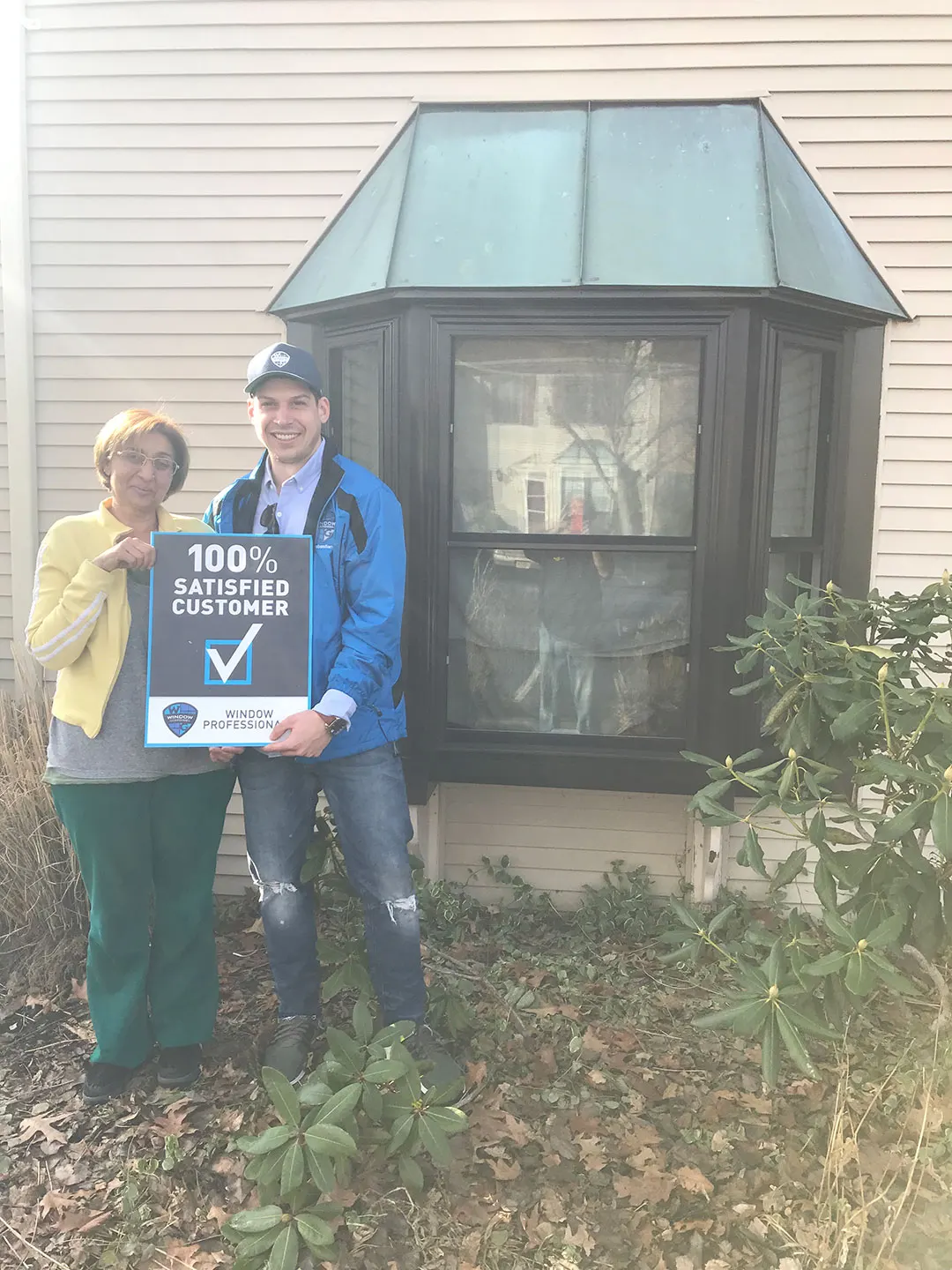 Window Guardians Our Story carousel - Sebastian with a satisfied homeowner after a window project