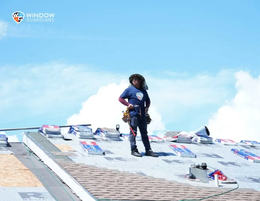 Roofing crew working on a residential roof