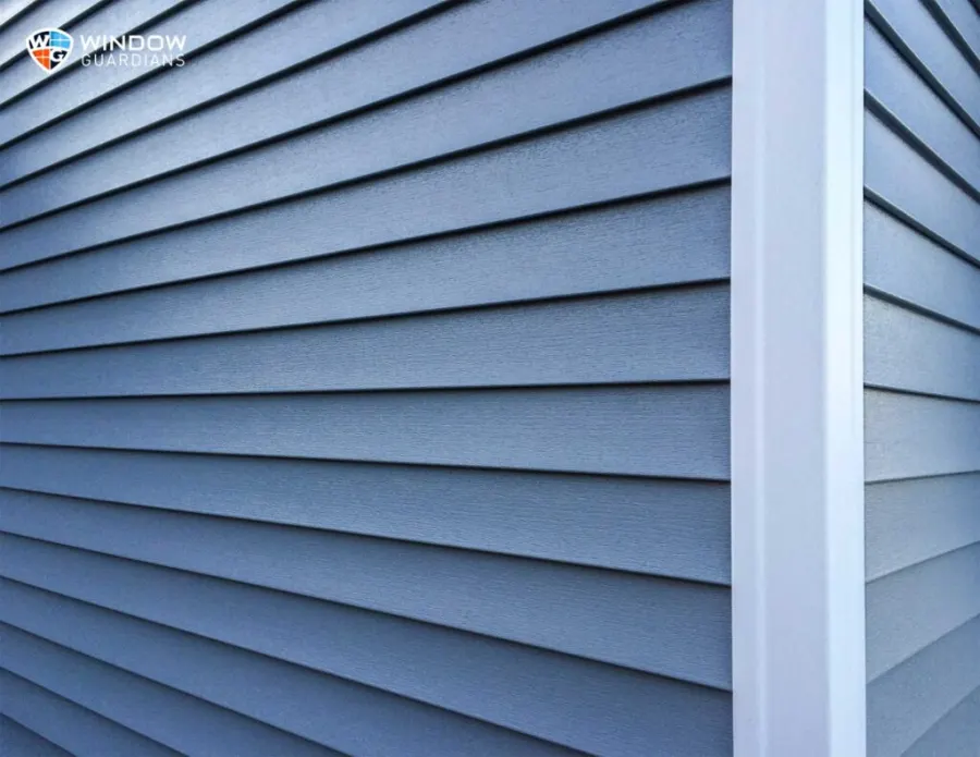 Finished siding installation on a suburban home